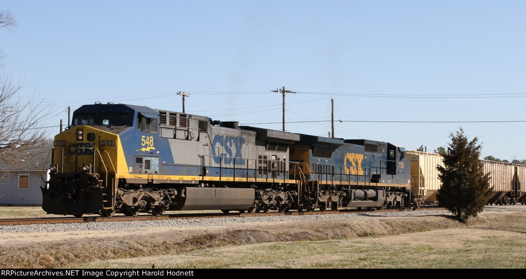 CSX 548 & 7795 lead train F728 towards the yard